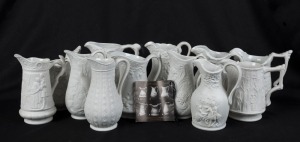 PORTMEIRION "BRITISH HERITAGE COLLECTION" set of twelve porcelain jugs. Factory mark to bases, plus card brochure, the tallest 12cm high