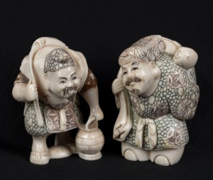 Two Japanese carved ivory statues with hand-coloured finishes, 20th century, seal marks to bases, ​​​​​​​6.5cm high each