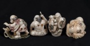 Four Japanese carved ivory netsuke of seated figures including a bird man, kneeling man, seated man with stick and a wandering man , 20th century, ​​​​​​​the largest 3.5cm high - 2