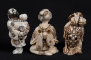 Three Japanese carved ivory netsuke of a man with a child, a Geisha, and a travelling man with a sack, 20th century, ​​​​​​​the largest 5cm high - 3
