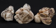Three Japanese carved ivory netsuke of a man with a child, a Geisha, and a travelling man with a sack, 20th century, ​​​​​​​the largest 5cm high - 4