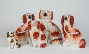 STAFFORDSHIRE group of five assorted antique dog statues, 19th century, the largest 26cm high