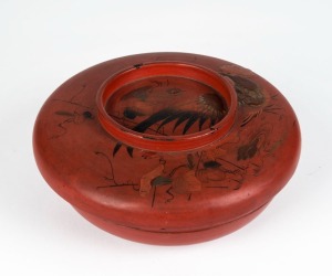 An antique Japanese red lacquered bowl with cockerel decoration, A/F, Meiji period, 19th century, 10cm high, 22cm diameter