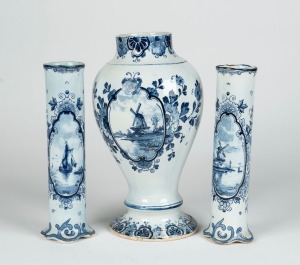 Three Dutch Delft blue and white ceramic vases, early 20th century, the largest 27cm high