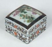 A Chinese porcelain lidded box of square form with hand-painted landscape scene, 20th century, iron red seal mark to base, 5cm high, 6cm wide, 6cm deep - 2