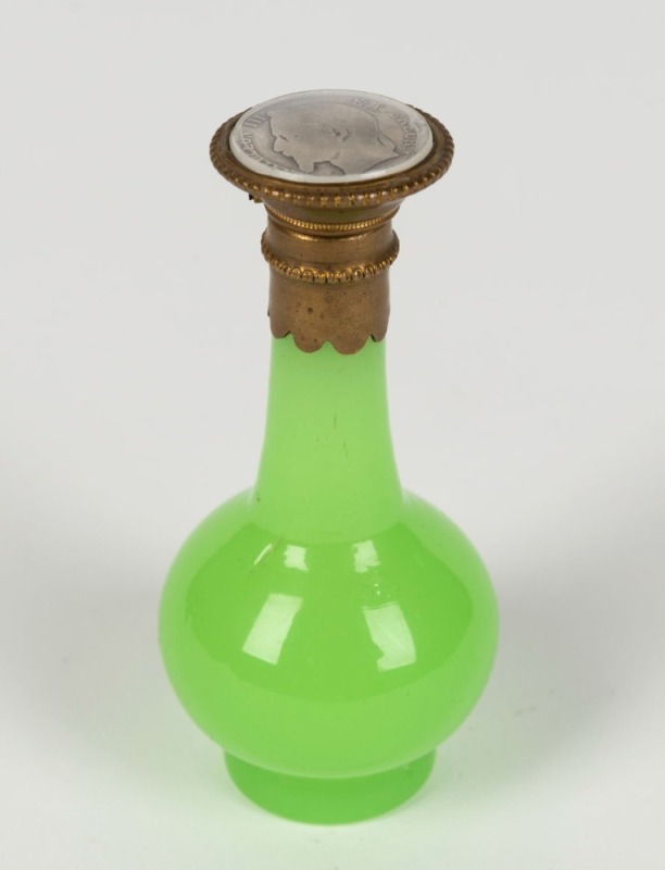 Napoleon III French uranium glass scent bottle with gilt metal mounts inset with a coin, 19th century, 9cm high 