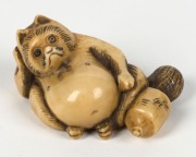 Three Japanese carved ivory netsuke in the form of a fox, man with monkey and conch shell,&nbsp; ​​​​​​​the largest 6cm high&nbsp; - 2