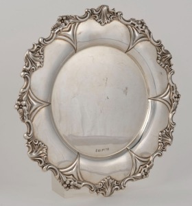 A sterling silver salver with floral border, made in Sheffield circa 1901, 26cm wide, 498 grams
