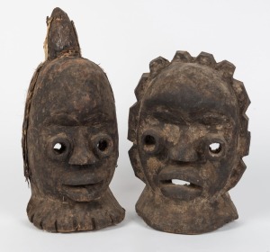 Two sculptural heads, carved wood, fabric and fur, Liberia, West Africa, 31cm and 38cm high