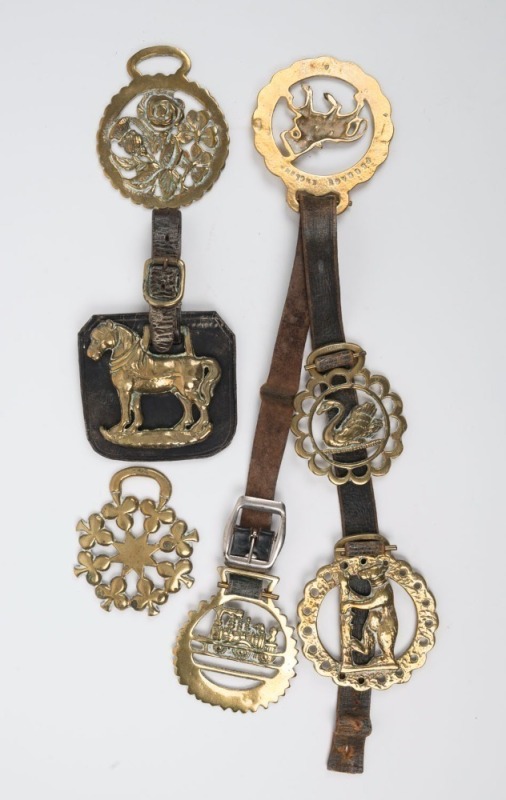 HORSE BRASSES, group of seven, 19th century, 