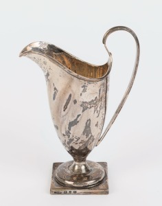 An English sterling silver cream jug, made in Birmingham, circa 1897, 14cm high, 108 grams
