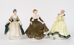 ROYAL DOULTON group of three English porcelain figures comprising "Geraldine" (HN 2348), "Paula" (HN 2906), and "Elegance" (HN 2264), the largest 19cm high