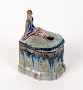 A German Art Deco figural porcelain jewellery box, circa 1930s, ​​​​​​​15cm high