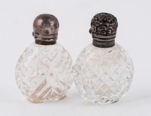 Two antique sterling silver topped crystal scent bottles, 19th century, ​​​​​​​5cm and 4.5cm high
