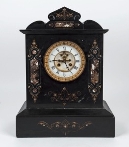 A large French black slate and variegated marble mantel clock with incised gilt scroll decoration, two piece enamel dial with exposed Brocot escapement, 8 day time and bell striking movement, circa 1880. 47cm high, 35cm wide, 19cm deep