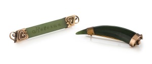 Two antique New Zealand greenstone brooches with gold mounts, 19th century, 6.5cm and 5.5cm long