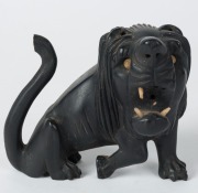 A Chinese carved wooden lion statue, a carved jade basket ornament, a carved stone figural group, a metal seal, and a pottery whistle, (5 items), ​​​​​​​the largest 11cm high - 3