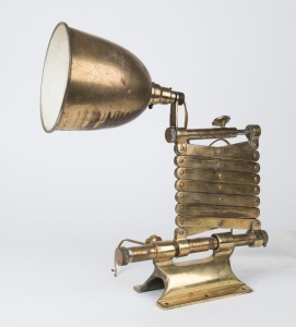 A vintage brass expanding industrial light with wall mount, circa 1930, 88cm long when expanded