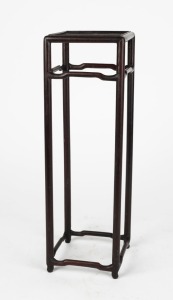 An antique Chinese timber stand, 19th century, 40.5cm high, 13cm wide, 13cm deep