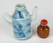 An antique Chinese porcelain dish, a Ming Dynasty blue and white porcelain water pourer, an amber opium bottle and two wooden stands, (5 items), ​​​​​​​the dish 14.5cm wide - 3
