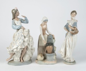NAO Spanish porcelain group of three statues of ladies, 20th century, the largest 36cm high