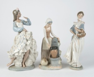NAO Spanish porcelain group of three statues of ladies, 20th century, the largest 36cm high