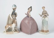 LLADRO Spanish porcelain statue of a young lady in a pink dress; together with two NAO Spanish porcelain statues, 20th century, (3 items), the Lladro&nbsp;27cm high