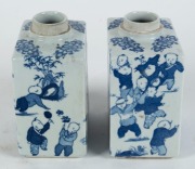 A Chinese moulded blue porcelain vase, Republic period, with Kangxi mark; together with a pair of Chinese blue and white porcelain tea caddies and a lidded vase, (4 items), ​​​​​​​the largest 22cm high - 2