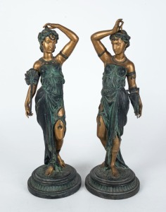 A pair of reproduction classical style bronze statues of ladies, late 20th century, ​​​​​​​46cm high