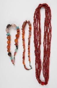 Three necklaces, coral, carnelian and rock crystal, the largest 86cm long