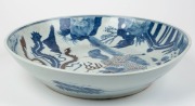 A Chinese porcelain copper red and blue serving bowl with phoenix and Buddhist lion, 19th century, ​​​​​​​38cm diameter - 2
