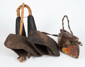 West African metal gong, wooden cowbell and two metal cowbells, (4 items), ​​​​​​​the largest 26cm high 