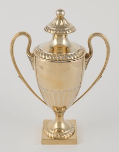 An English sterling silver lidded urn in the Neo-Classical style with remains of gilt finish, made in London, 1915, 20cm high, 348 grams
