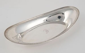 An antique sterling silver oval bread tray, most likely American, circa 1900, stamped "STERLING", 28.5cm wide, 220 grams