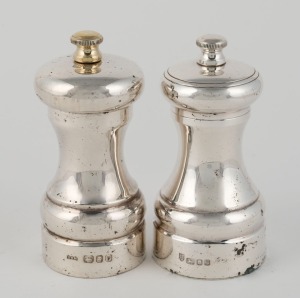Two English sterling silver pepper mills, 20th century, 10.5cm and 10cm high