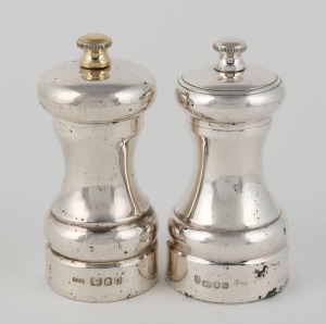 Two English sterling silver pepper mills, 20th century, ​​​​​​​10.5cm and 10cm high