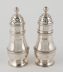 A pair of English sterling silver sugar casters, made in London, 20th century, 11cm high, 198 grams total