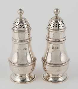 A pair of English sterling silver sugar casters, made in London, 20th century, ​​​​​​​11cm high, 198 grams total