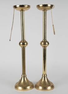 A pair of brass church candlesticks with snuffs, 20th century, ​​​​​​​62cm high