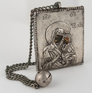 An early Russian silver icon, mounted on a chain with bell, 17th/18th century,the icon 8.5cm high, 32cm long overall