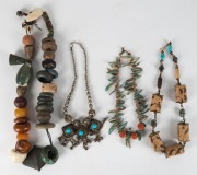 Five assorted pieces of tribal jewellery including West African wealth necklace,