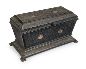 An antique Indian storage box, ebonized and carved teak with four hand-painted portrait vignettes, 19th/20 century, 44cm high, 82cm wide, 42cm deep