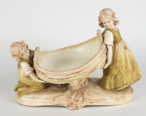 AMPHORA Austrian figural porcelain centrepiece bowl, late 19th century, 29cm high, 41cm wide