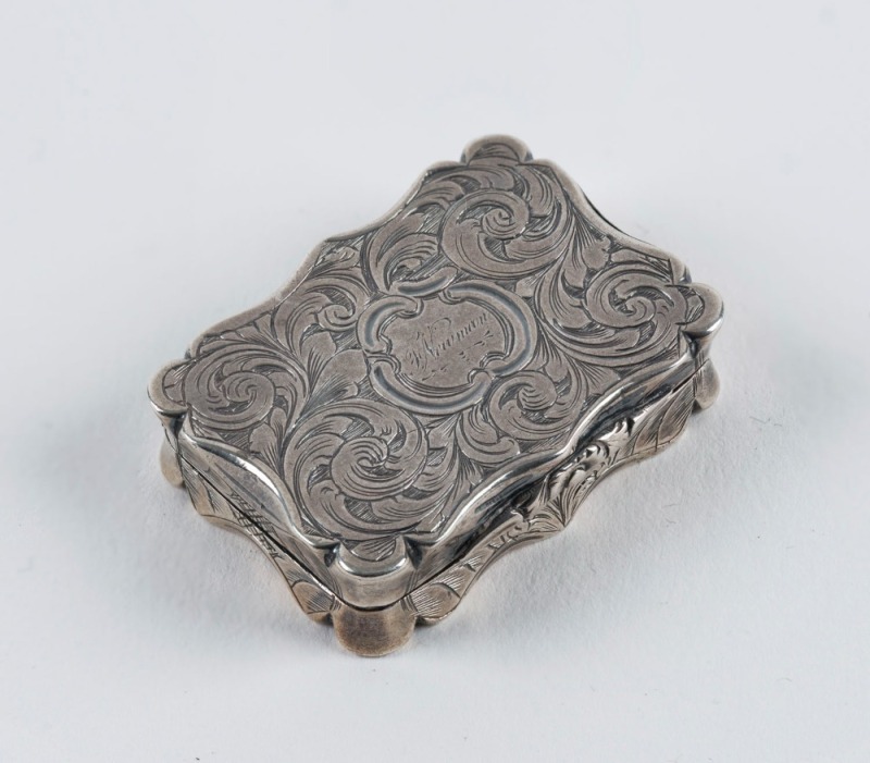 An antique English sterling silver vinaigrette, stamped "D.P.", Birmingham, circa 1854, ​​​​​​​3.8cm wide