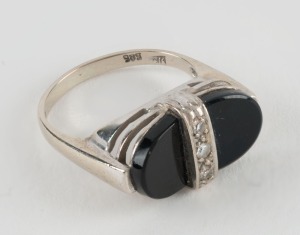 An Art Deco 14ct white gold ring, set with black onyx and diamonds, housed in a Wm. Drummond & Co. box