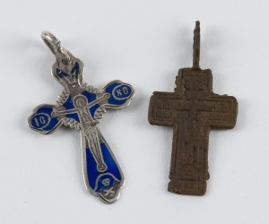 A Russian silver and enamel crucifix pendant, together with a Russian Old Believers bronze crucifix pendant, (2 items), each approximately 3.5cm high