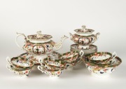 Antique English porcelain tea set for eight including teapot, sugar bowl, slops bowl, two cake plates, eight cups and nine saucers,&nbsp;early to mid 19th century, (22 items), ​​​​​​​the cake plates 24cm wide