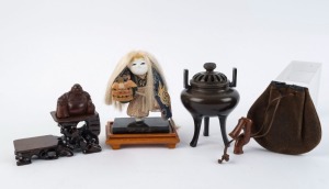 Japanese bronze koro, doll, carved wooden Buddha, wooden stand and a leather pouch with carved boxwood netsuke, (5 items), the koro 13cm high