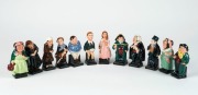 ROYAL DOULTON&nbsp;"CHARLES DICKENS" group of twelve&nbsp;porcelain figures including Buzfuz, Bill Sikes, Oliver Twist, Fagin, Tiny Tim, Bumble, Scrooge, Sairy Gamp, Mrs. Bardell, Tony Weller, Little Nell, and Fat Boy, the largest 12cm high