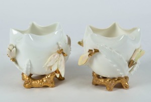 MOORE BROTHERS pair of English porcelain vases with cactus decoration, 19th century, pink factory mark to the bases, 9.5cm high, 10cm wide